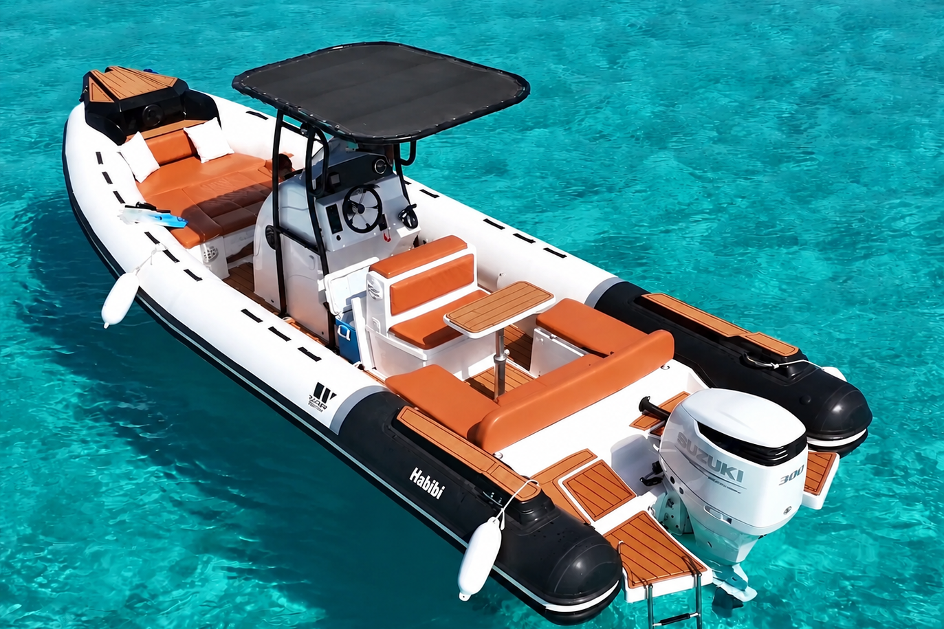 Korallenriff und Schnorchler zwischen Orange Bay und White Island